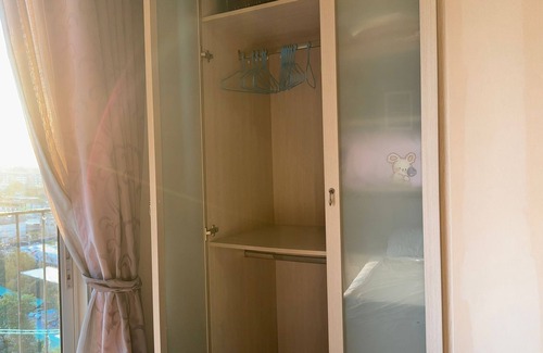 Rat Burana Apartment | 1-bedroom riverside Bangkok apartment with washing machine, infinity pools, etc