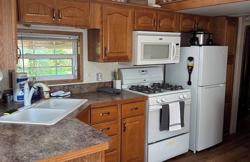 McGregor RV Rental | 1 bedroom, 2 loft Park Model in campground in Marquette, Iowa.