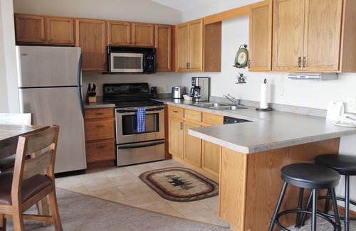 Eagle River Condo | 1 Bedroom, balcony beach view condo @ Duck Lake