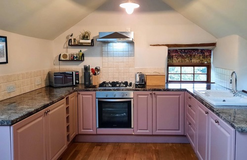 Redruth House | 1 bedroom barn conversion on smallholding with alpacas, goats and pigs