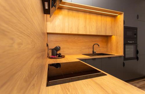 Spisska Nova Ves Apartment | 1-Bedroom LUX Apartment with Balcony & Underground Parking Garage