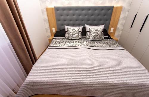 Spisska Nova Ves Apartment | 1-Bedroom LUX Apartment with Balcony & Underground Parking Garage