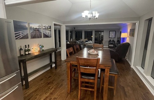 Lake Highlands House | 1 bedroom suite in remodeled luxury home. private hallway, bed, bath.