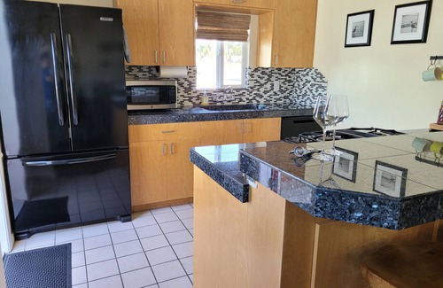 Ocean Beach House | 1 block from the beach, family friendly, w/private backyard & air conditioning