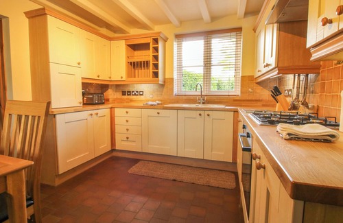 St Martins Cottage | 1 CLARKES LANE, pet friendly, with hot tub in St Martins