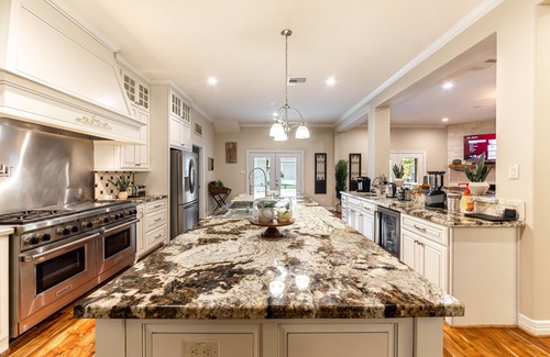 Tomball House | 1-LvL Family Paradise, 2 King Suites, Pool, HUGE Covered Patio, Yard, OD Kitchen
