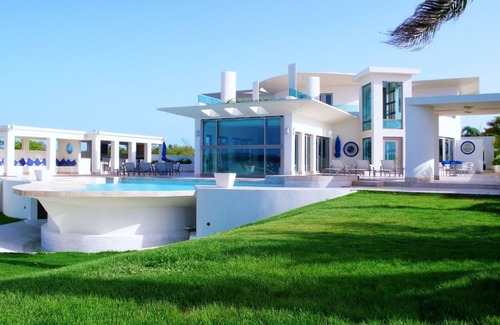 Cove Bay Villa | 10,000sq ft Villa- 5 Suites, Infinity Pool, West End!