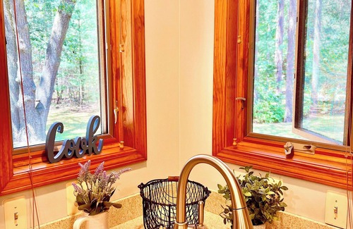 Manistee House | 10 acres of woodland PRIVACY: charming 3-bedroom home by Manistee w/WiFi, AC
