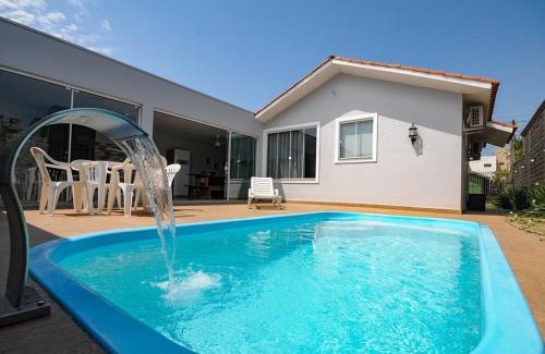 Foz do Iguacu House | 10 hóspedes - PISCINA água salgada - Cozinha GOURMET - 4 quartos - 3 banheiros - 2,1 km do Cataratas JL Shopping