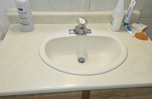 Prince George House | 10 minute walk to the hospital! Cozy home in a quiet area near many amenities.