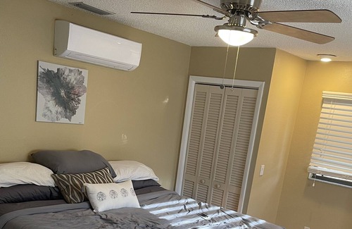 South Gate Ridge House | 10 minutes to siesta key beach! Hot tub an pool heated two master bedrooms!