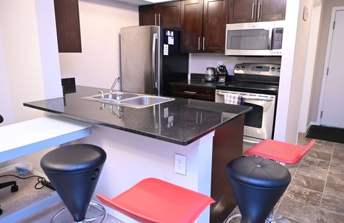 Northeast Edmonton Condo | 10 minutes to the LRT station and Rec Centre! Family-sized condo with patio.