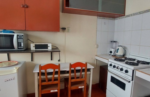 Miraflores House | 10 minutes walking from Kennedy park. Access to a kitchen and a terrace.
