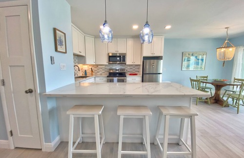 Treasure Cay Condo | 100% Renovated Ground floor condo w/Boat Slip - 3 min walk to beach!