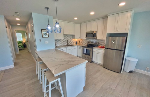 Treasure Cay Condo | 100% Renovated Ground floor condo w/Boat Slip - 3 min walk to beach!