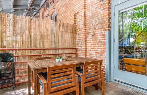Downtown Apartment | 100 Year-Old Historic Brick 2BR Loft |Large Patio2