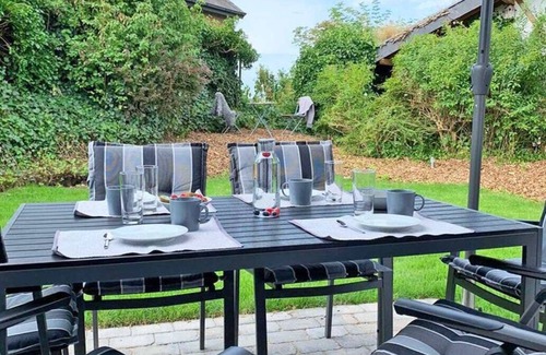 Ruckeberg House | 100m away from the beautiful Schlei, you will find our extensively renovated and modern bungalow "Schlei-Idyll" with maritime details, as well as a small garden area with terrace for your well-deserved time out