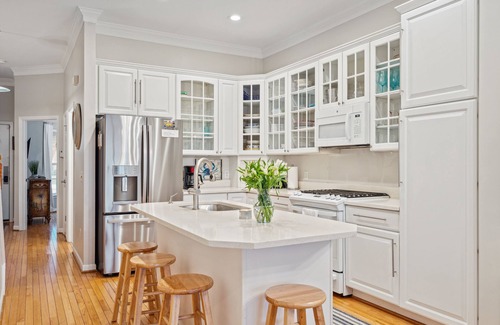 Waters Edge House | 110 Waters Edge! Luxury River Views with Community Pool, Screen Porch