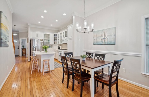 Waters Edge House | 110 Waters Edge! Luxury River Views with Community Pool, Screen Porch