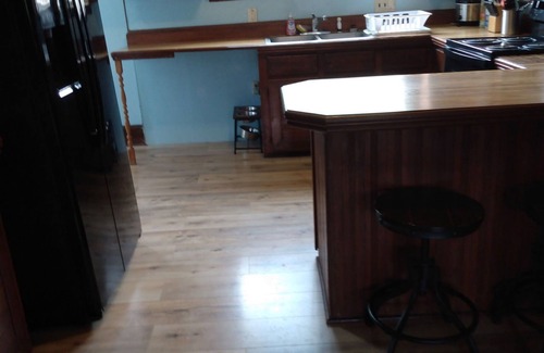 Cawker City House | 110 year old Renovated farm house in the heart of Cawcker city