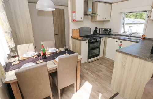 Felinfach Cottage | 116 WOODPECKER LODGE, pet friendly in Llanarth