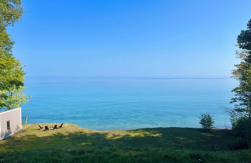 Cheboygan Cottage | 125 ft of Private BEACHFRONT with large, secluded yard & spectacular views!