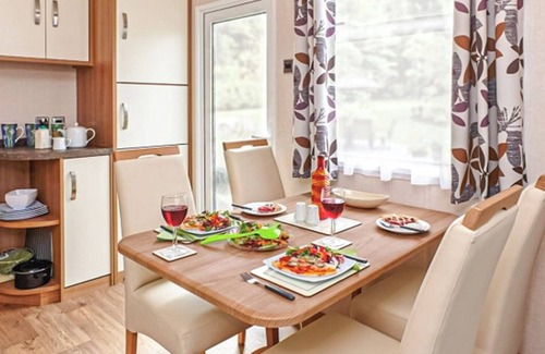 Wigton House | 12ft-wide caravan with one double and two twin.