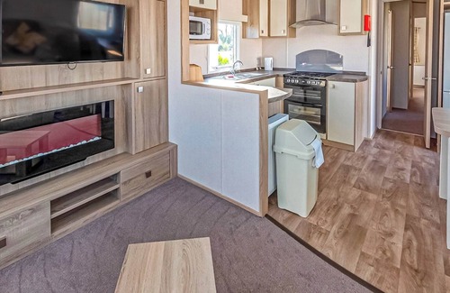 Wigton House | 12ft-wide caravan with one double and two twin.