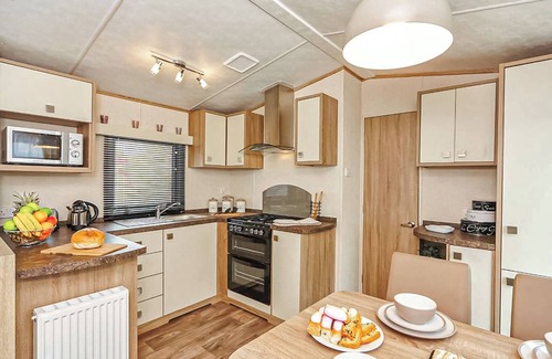 Wigton House | 12ft-wide caravan with one double and two twin.