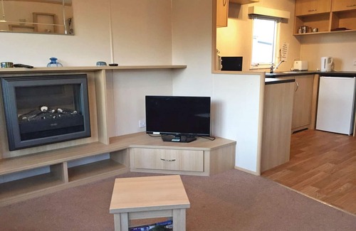 York House | 12ft-wide caravan with one double and two twin.