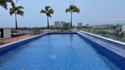 Diaz Ordaz Apartment | 15 Minute Walk to Beach KING Bed Rooftop Pool