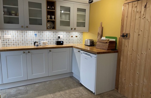 Christchurch Cottage | 17th Century character cottage in pretty Devon village