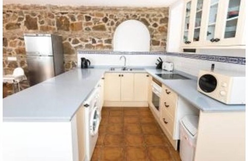 Malaga-Este Apartment | 17th century convent offering family holidays with pool, tennis & amazing views