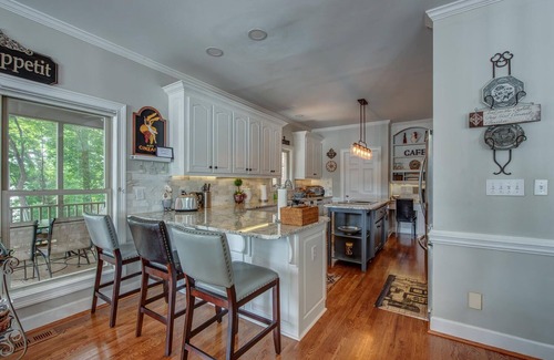 Belmont House | 180 degree lake view, 300 ft. of shoreline, heated pool, and private beach.