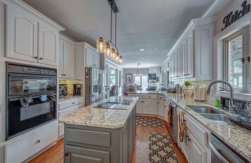 Belmont House | 180 degree lake view, 300 ft. of shoreline, heated pool, and private beach.