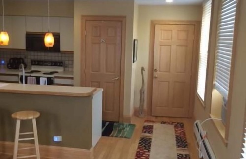Harbor Springs Apartment | 180' Views of the bluff, Main Street, and a bit of the Harbor!