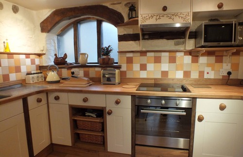 Penycae Cottage | 18th Century sandstone cottage with all modern comforts and old world charm.