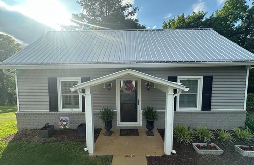 Tyler House | 1912 Farmhouse has large, covered porch & fire pit! Near Casino & The Pinnacle