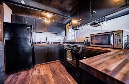 Aspen Brook Cabin | 1914 cabin - king bed, fireplace, fishing, views!