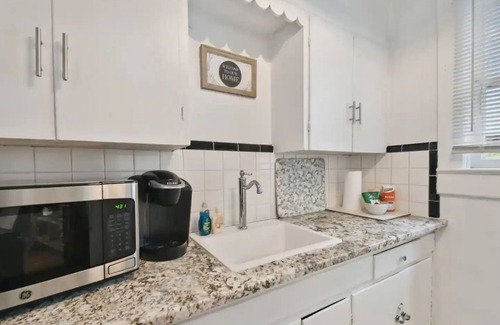 Tampa Heights Apartment | 1920s Cottage Downtown, Ybor with Hot Tub!
