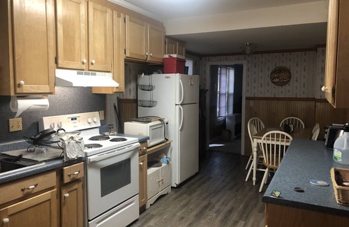 Ashe County House | 1940s Creekside Farmhouse