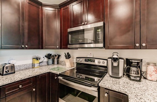Pelican Condo | 1st Floor 2 King Bd ~ Pool, Bikes, Beach, Golf, Baby Supplies, Walk Shops