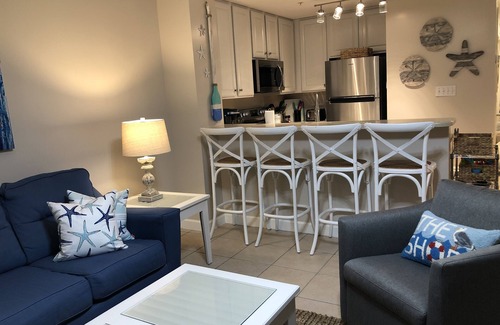 Lower Grand Lagoon Condo | 1st FLOOR UNIT - steps to the beach and pool! Book for the Fall season!