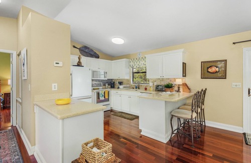 Pine Island Center House | 2/2 Heart of Pine Island Home, with Wrap Around Porch!