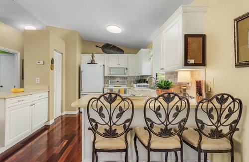 Pine Island Center House | 2/2 Heart of Pine Island Home, with Wrap Around Porch!