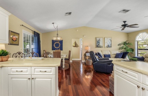 Pine Island Center House | 2/2 Heart of Pine Island Home, with Wrap Around Porch!