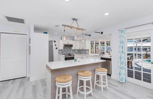 Saint James City House | 2/2 Pool Home on the Water, Boat Lift Included!