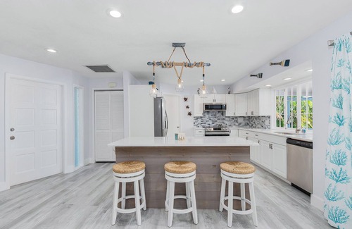 Saint James City House | 2/2 Pool Home on the Water, Boat Lift Included!