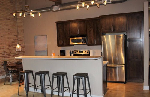 Grand Haven Condo | 2 BD/2BA Modern Condo in the Historic Downtown Armory