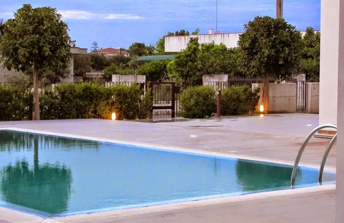 Ginosa Marina Apartment | 2 bed apt with shared pool in quiet cul de sac. 10-15min walk to sea.nSleeps4-6.
